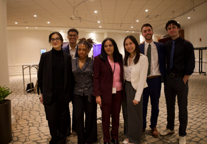 Stanley Davis, CC'26 (second from right) and Chinonye Omeirondi (third from left)